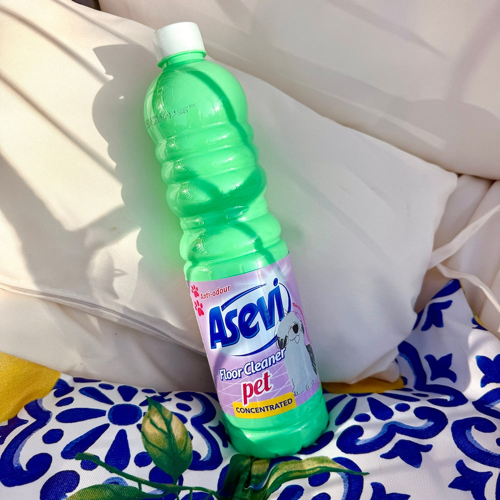 Bottle of asevi pets spanish floor cleaner scouse bird shop