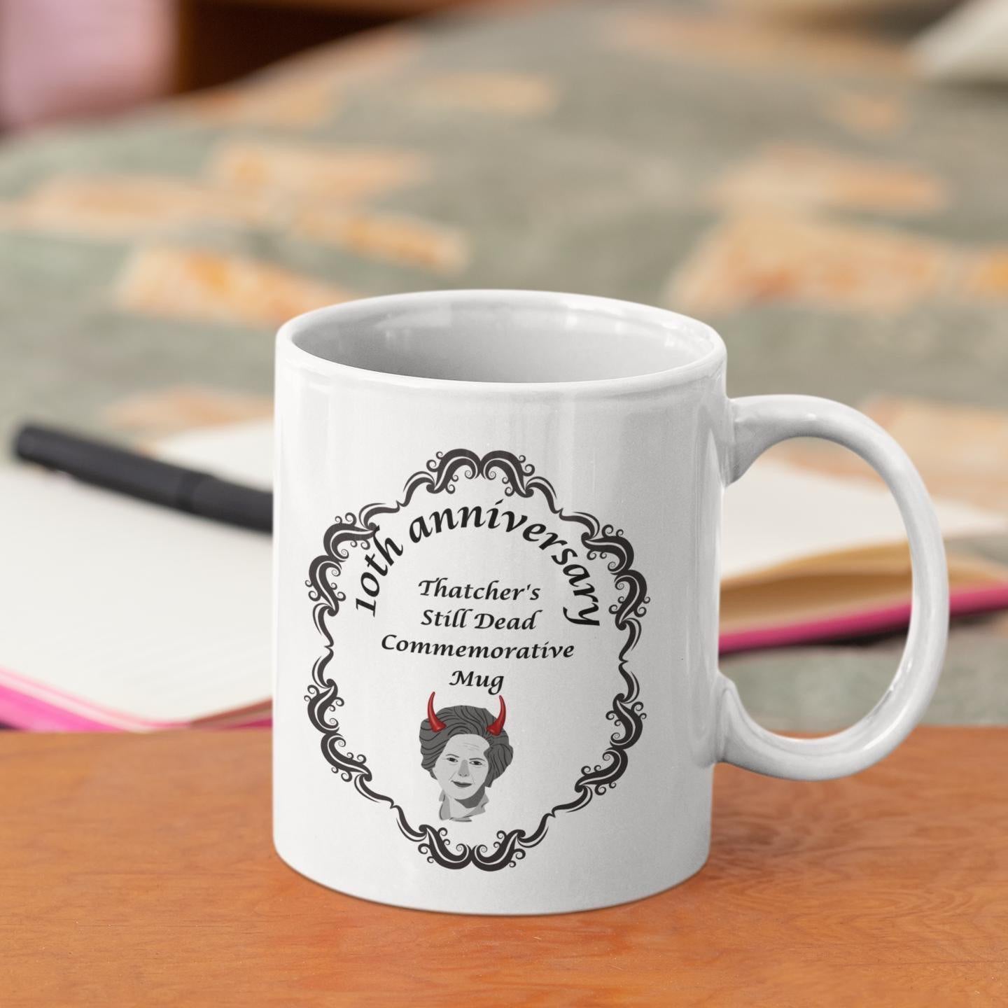 Thatcher Is Still Dead Commemorative 10th Anniversary Mug – ceramic mug featuring a bold political statement.