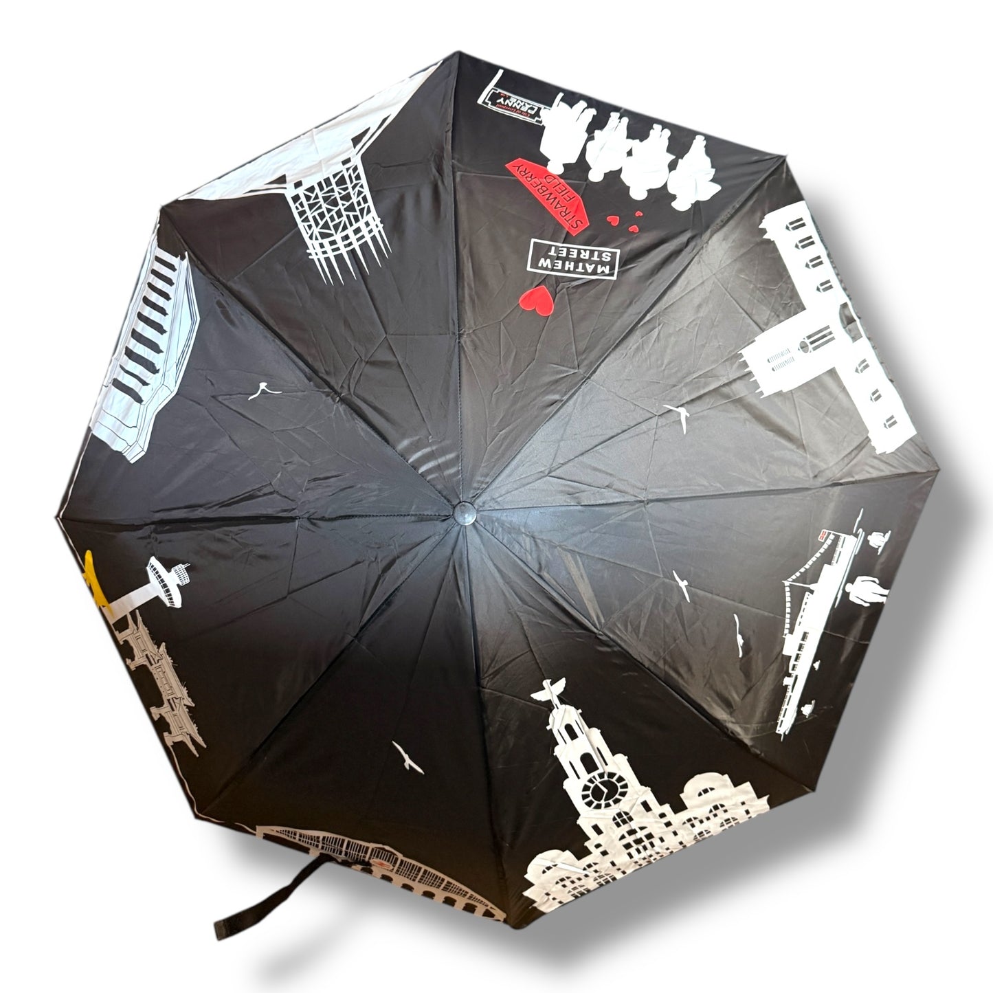 Black foldaway umbrella with white Liverpool skyline print – compact and stylish.