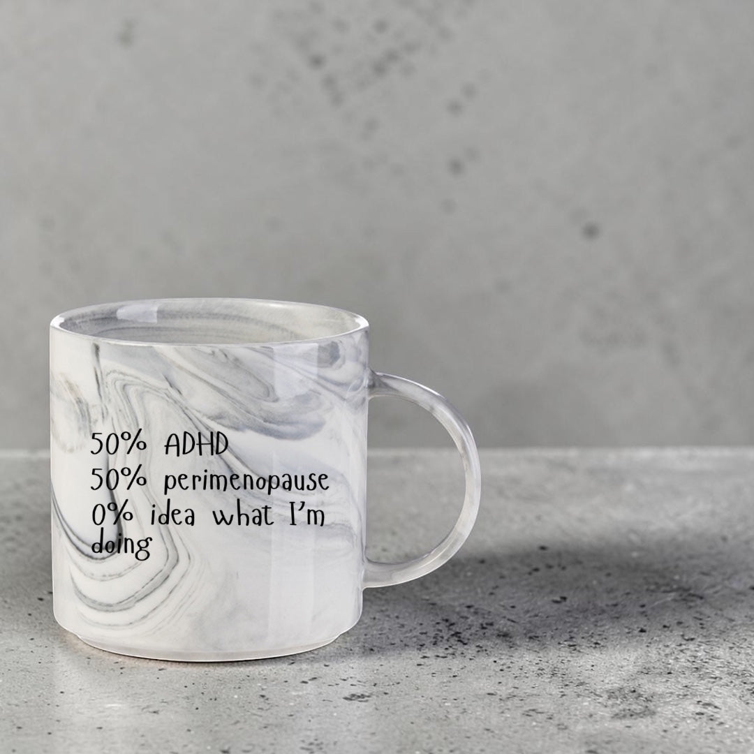Scouse Bird Shop 11oz ceramic mug in grey marble with black text reading 50% ADHD, 50% perimenopause, 0% idea.