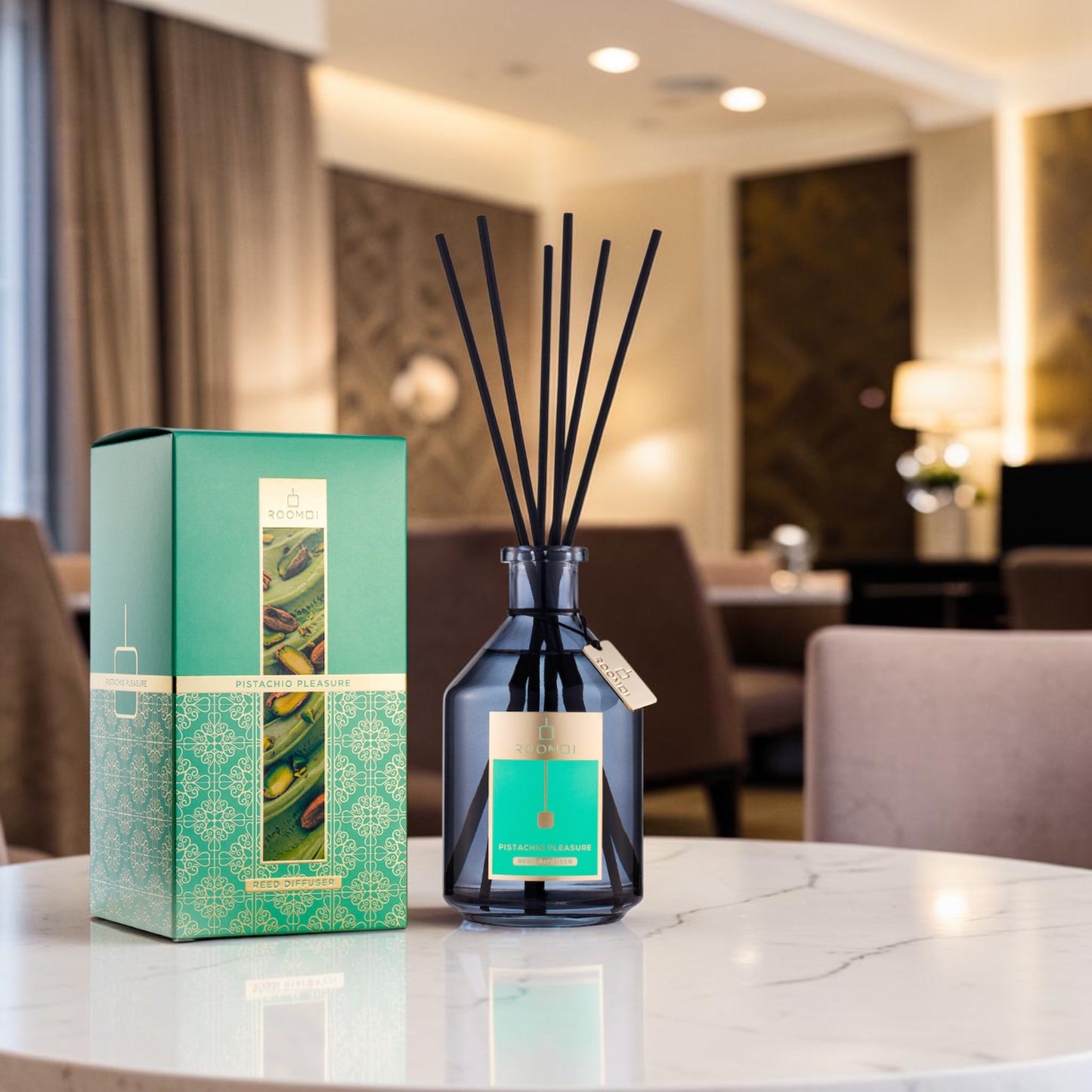 Scouse Bird Shop Roomoi Italian Reed Diffuser in Pistachio Pleasure scent, 500ml bottle with black reeds and green packaging.